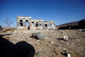Shoes of victims are seen at the site of a Saudi-led air strike which struck a house where mourners had gathered for a funeral north of Yemen's capital Sanaa, February 16, 2017. REUTERS/Mohamed al-Sayaghi
