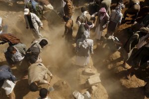 People bury judge Yahya Rubaid and his family, who were killed by a Saudi-led air strike, in Yemen's capital Sanaa January 26, 2016. REUTERS/Khaled Abdullah